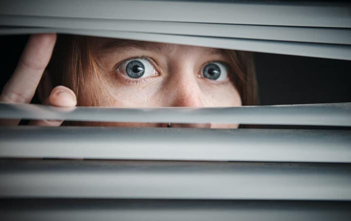 Is one eyewitness enough to prove that you’re guilty of a crime? Eyes visible through window blind