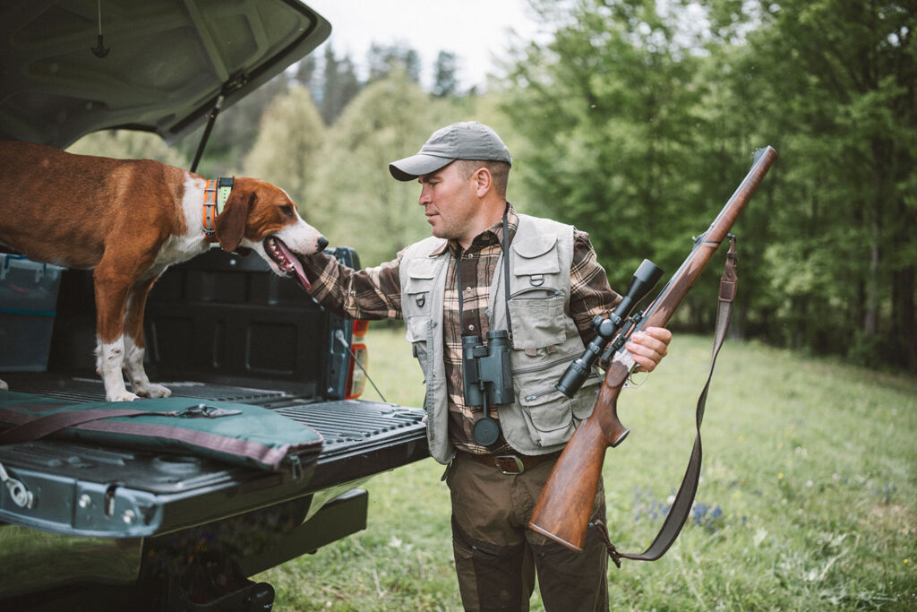firearms-weapons-laws–mn-SCL-opt Man with hunting rifle and dog
