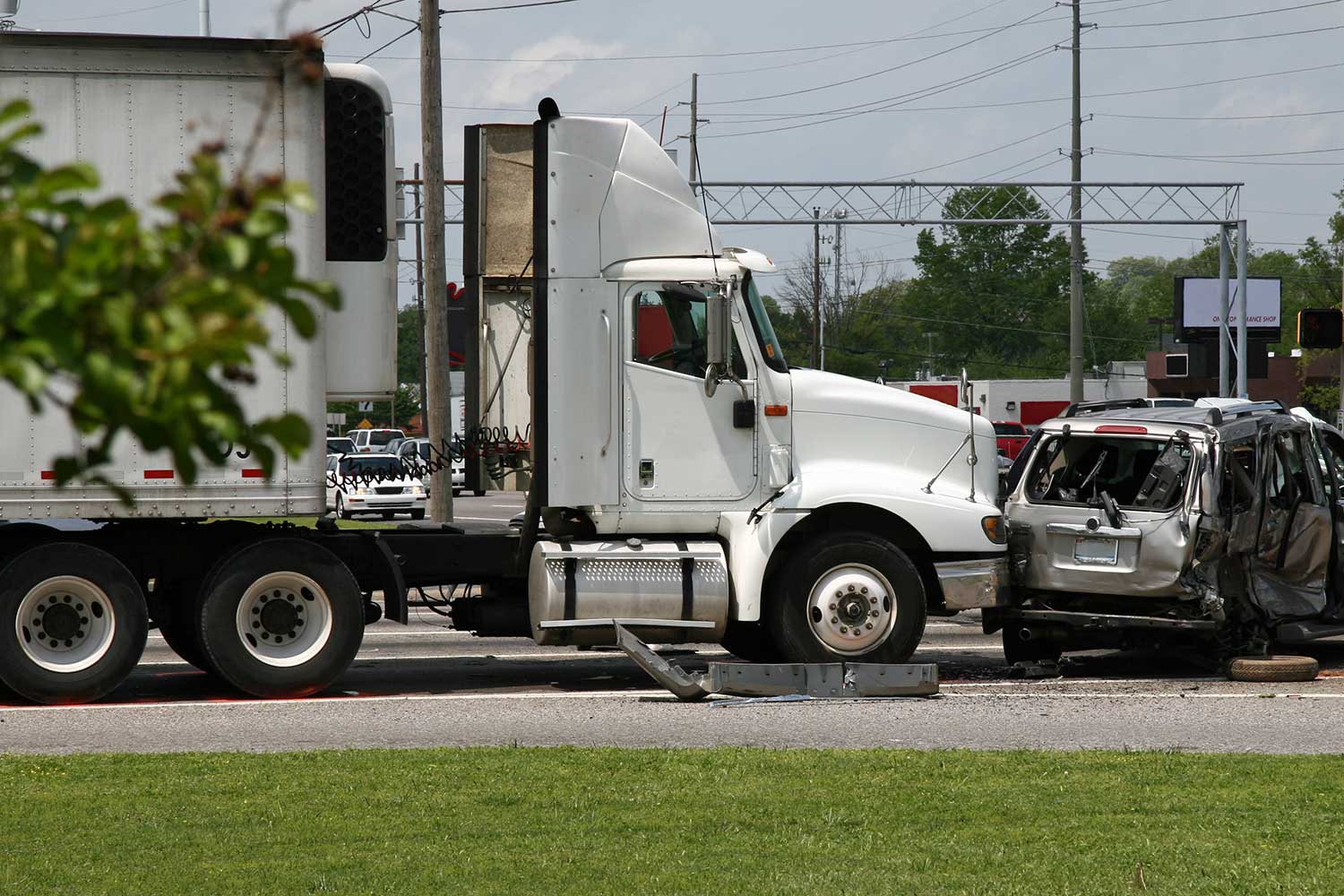 most common causes for semi truck accidents in minnesota, semi truck rear ends a passenger auto on a local road