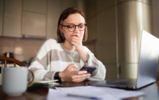 public assistance fraud, individual woman concerned about finances, home setting