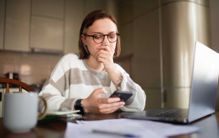 public assistance fraud, individual woman concerned about finances, home setting